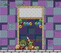 une photo d'Ã©cran de Puzzle Bobble - Bust a Move sur Nintendo Super Nes